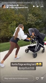 Paige Buechele (wife of Patrick Mahomes' former teammate Shane) pushing Bronze's stroller as Brittany looks on